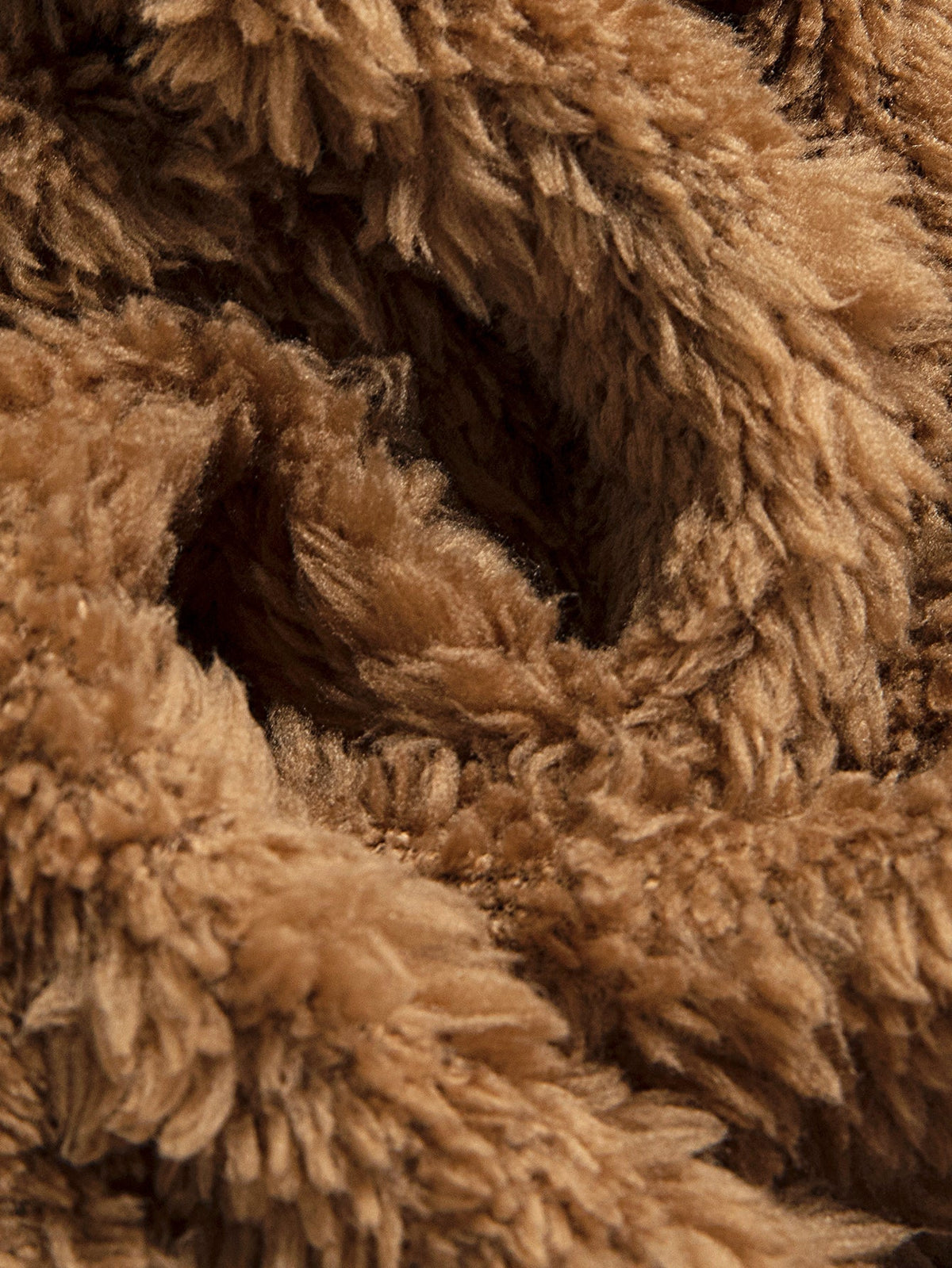 Teddyjacka med geometrisk jacquard