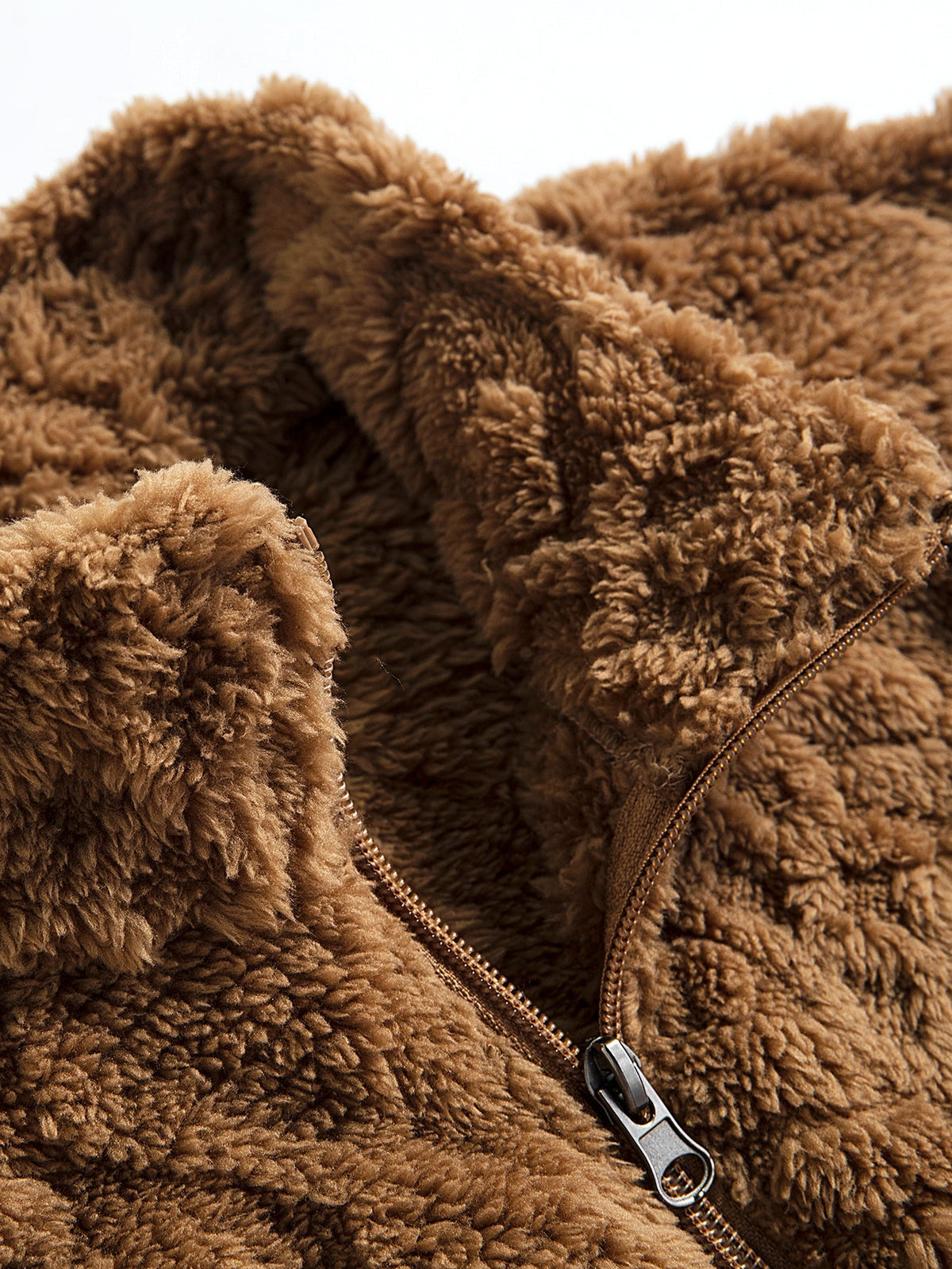 Teddyjacka med geometrisk jacquard