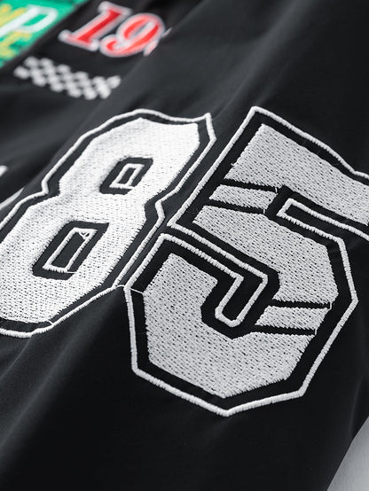 Broderad racingjacka i avslappnad passform