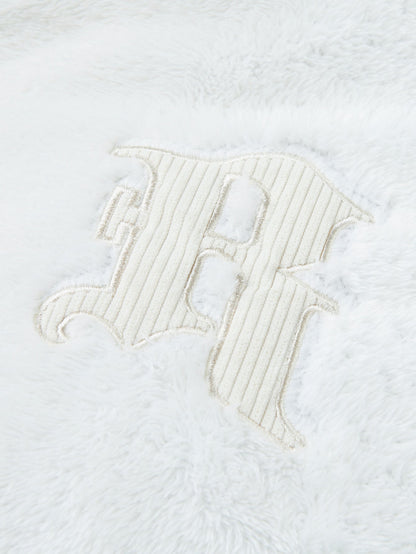Vändbar manchesterrock med teddyfleece
